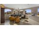 Comfortable living area with panoramic mountain views through expansive arched windows and plenty of seating at 7199 E Ridgeview Pl # 221, Carefree, AZ 85377