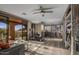 Expansive living room featuring an open floor plan and seamless indoor-outdoor flow to a patio at 7199 E Ridgeview Pl # 221, Carefree, AZ 85377