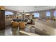 Comfortable living area with mountain views through expansive arched windows and inviting seating at 7199 E Ridgeview Pl # 221, Carefree, AZ 85377