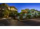 The community features a private pool area, surrounded by lush landscaping and secure fencing at 7199 E Ridgeview Pl # 221, Carefree, AZ 85377