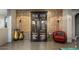 View of built in wine cellar in dining room with vases and decor at 7199 E Ridgeview Pl # 221, Carefree, AZ 85377