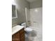 Standard bathroom featuring a tub/shower combination, toilet, and vanity with neutral finishes at 814 S 80Th St, Mesa, AZ 85208