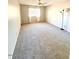Bedroom with natural light, carpet, standard window, lamp and neutral paint at 814 S 80Th St, Mesa, AZ 85208