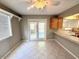 Bright dining area with tile floor, white trim doors and windows and wood cabinets at 814 S 80Th St, Mesa, AZ 85208