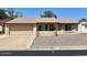 Single story home features a spacious garage, desert landscaping, and a neutral color palette at 814 S 80Th St, Mesa, AZ 85208