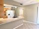 A kitchen featuring a tiled countertop with lots of cabinet space and modern appliances at 814 S 80Th St, Mesa, AZ 85208