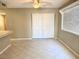 A living room features large white closets and plenty of natural light from a window with blinds at 814 S 80Th St, Mesa, AZ 85208