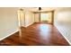 Open concept living room with hard wood floors, ceiling fan and natural light at 814 S 80Th St, Mesa, AZ 85208