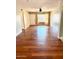 Open concept living room with hard wood floors, ceiling fan and natural light at 814 S 80Th St, Mesa, AZ 85208