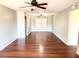 Bright living room featuring hardwood floors, ceiling fan and large window providing great natural light at 814 S 80Th St, Mesa, AZ 85208