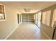 Additional living space featuring tiled floor, windows and sliding door access to the exterior at 814 S 80Th St, Mesa, AZ 85208
