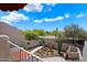 Private courtyard featuring desert landscaping, a charming fountain, and serene outdoor space at 8879 E Greenview Dr, Gold Canyon, AZ 85118