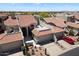Exterior view of home featuring a private rooftop patio and desert landscaping at 8879 E Greenview Dr, Gold Canyon, AZ 85118