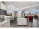 Open kitchen and dining area features granite countertops and seamless flow to living area at 8879 E Greenview Dr, Gold Canyon, AZ 85118