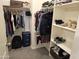 Spacious walk-in closet with custom shelving and ample storage for clothes and accessories at 9137 W Coolbrook Ave, Peoria, AZ 85382