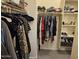 Walk-in closet with plenty of storage with rods, shelves, and drawers at 9137 W Coolbrook Ave, Peoria, AZ 85382