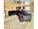 Cozy living room with a large sectional sofa and open layout, perfect for entertaining at 9137 W Coolbrook Ave, Peoria, AZ 85382