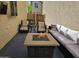 Cozy outdoor patio featuring a fire pit, comfortable seating, and a private setting for relaxation at 9137 W Coolbrook Ave, Peoria, AZ 85382