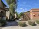 Attractive homes line a beautifully landscaped walkway in a desirable community at 9137 W Coolbrook Ave, Peoria, AZ 85382