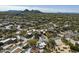 Picturesque aerial view of a desert community with mountain views at 9154 E Sunflower Ct, Scottsdale, AZ 85266