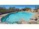 Sparkling community pool with ample seating and meticulously landscaped surroundings at 9154 E Sunflower Ct, Scottsdale, AZ 85266