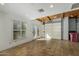 Spacious 2-car garage with Saltillo tile, natural wood beam ceiling and lots of natural light at 9154 E Sunflower Ct, Scottsdale, AZ 85266