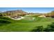 Scenic golf course with lush green fairways and stunning mountain views at 9154 E Sunflower Ct, Scottsdale, AZ 85266