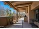 Relaxing outdoor patio with a covered area, built-in grill, and scenic desert views at 9154 E Sunflower Ct, Scottsdale, AZ 85266