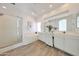 Bright bathroom features separate shower, soaking tub, and double sink vanity with lots of counter space at 11832 E Clinton St, Scottsdale, AZ 85259