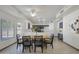 Open-concept dining room connects seamlessly to the kitchen with ample natural light at 11832 E Clinton St, Scottsdale, AZ 85259
