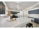 Bright kitchen features white countertops and stylish gray cabinets for a modern, inviting space at 11832 E Clinton St, Scottsdale, AZ 85259