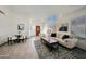 Inviting open-concept living area features ample natural light and stylish contemporary furnishings at 11832 E Clinton St, Scottsdale, AZ 85259
