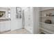 Bright bathroom featuring a walk-in shower and built-in shelving at 1320 W Kennedy Ave, Coolidge, AZ 85128