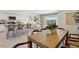 Open floor plan featuring a kitchen island that transitions to a dining area and living room at 1360 W Hess Ave, Coolidge, AZ 85128