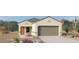 Charming single-story home with desert landscaping, a two-car garage, and a welcoming front entry at 1408 W Hess Ave, Coolidge, AZ 85128