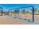 Fun playground featuring swings with soft landing and shade trees around at 1408 W Hess Ave, Coolidge, AZ 85128