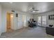 Bedroom with ceiling fan, desk, balcony access and mountain views at 154 W 5Th St # 212, Tempe, AZ 85281