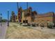 Townhome complex featuring colorful exterior with well-manicured landscaping at 154 W 5Th St # 212, Tempe, AZ 85281