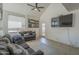 Modern living room has tile floors, comfortable seating and a TV at 154 W 5Th St # 212, Tempe, AZ 85281