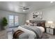 A contemporary main bedroom features a king bed, balcony, and modern decor at 154 W 5Th St # 212, Tempe, AZ 85281