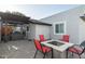 Backyard has an outdoor entertaining space with outdoor seating and landscaping at 2025 N 87Th Way, Scottsdale, AZ 85257