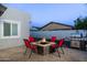 Private backyard features a cozy fire pit area and barbecue grill for outdoor enjoyment at 2025 N 87Th Way, Scottsdale, AZ 85257
