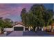 Charming single-Gathering home featuring a well-manicured yard and an attached two-car garage at 2025 N 87Th Way, Scottsdale, AZ 85257