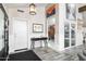 Welcoming foyer with a tiled floor, stylish decor, and a view to the outdoor space at 2025 N 87Th Way, Scottsdale, AZ 85257