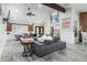 Spacious living room offers a large gray sectional, stylish decor, and a cozy atmosphere at 2025 N 87Th Way, Scottsdale, AZ 85257