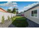 Relax and unwind in your own backyard, featuring a custom putting green at 2025 N 87Th Way, Scottsdale, AZ 85257