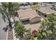 An aerial view of the exterior of the house with a desert landscape at 21192 E Stirrup St, Queen Creek, AZ 85142