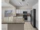 Well-appointed kitchen featuring granite countertops, stainless steel appliances, and white cabinetry at 21192 E Stirrup St, Queen Creek, AZ 85142