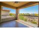 Covered balcony area with desert views, and rod iron railing providing fresh air and great sunlight at 2425 W Bronco Butte Trl # 2028, Phoenix, AZ 85085