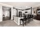 Modern kitchen with granite countertops, stainless steel appliances, and bar seating at 2425 W Bronco Butte Trl # 2028, Phoenix, AZ 85085